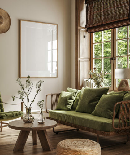 Poster frame mock-up in home interior background with sofa, tabl